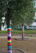 Yarn on trees: Yarnbombing - beautifying public space through knitting