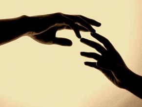 Engaged living: We're all in this together - hands reaching to each other