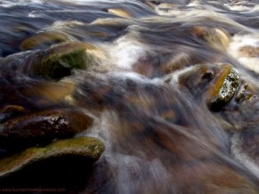 Accept the flow: Control your thoughts and let events run their course - image water-over-rocks