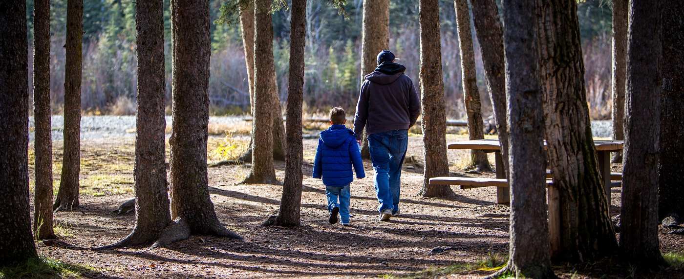 PARENTING WITH INTENTION: An introduction to intentional parenting by Rob Stringer 13 Father and young son walking outdoors