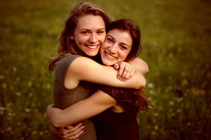 two girls hugging