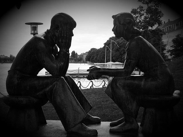 Statue of couple communicating - beginning anew