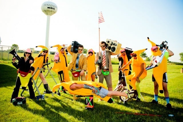 party-revolution. Image group of men with boomboxes dressed in banana suits