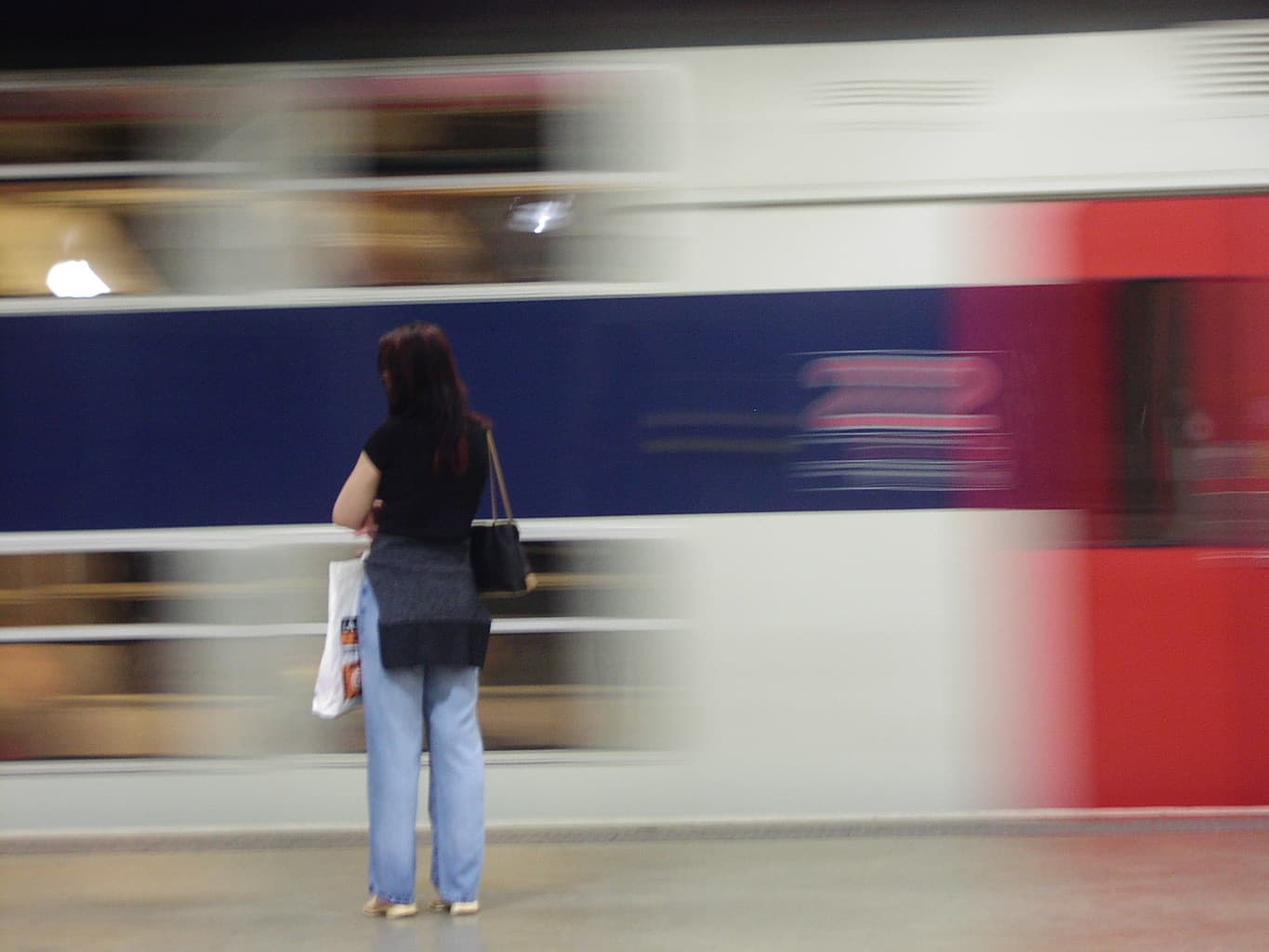 ARE WE EVER REALLY READY?: The quarter-life crisis in perspective 67 woman standing train station