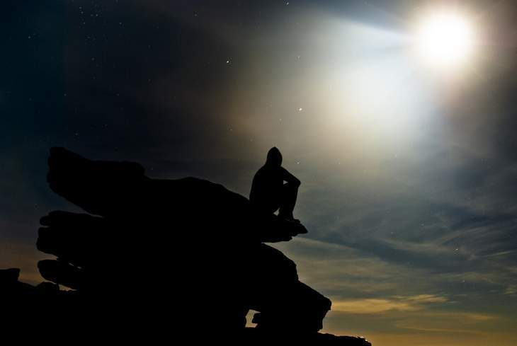 CONTEMPLATION: The Cutting Edge 13 Person on rock - Contemplating and understanding the past