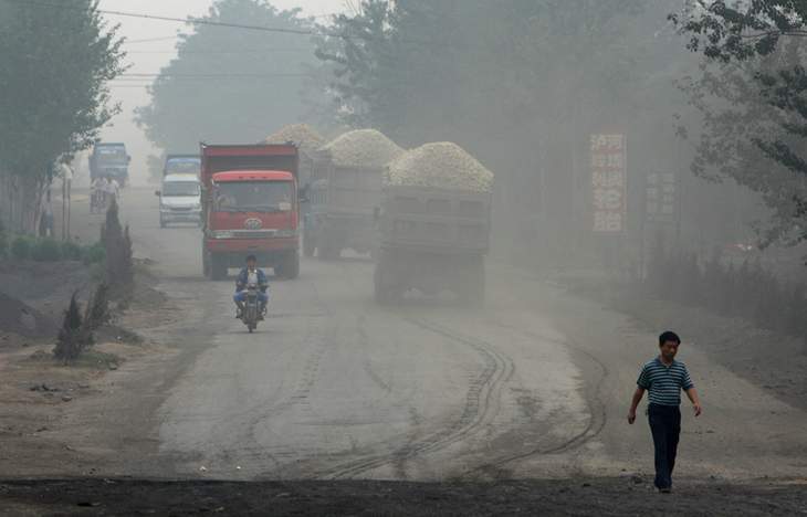 Trucks on road - The Dirtiest Place on the Planet
