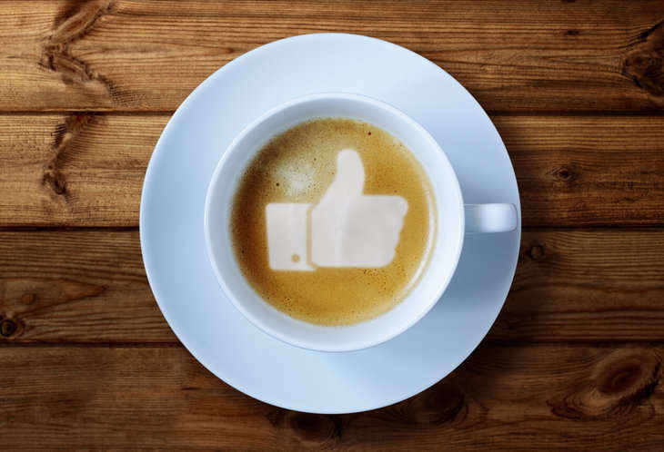 coffee cup with thumbs up in foam - participation in a virtual world