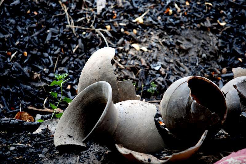 broken earthenware jars on the ground