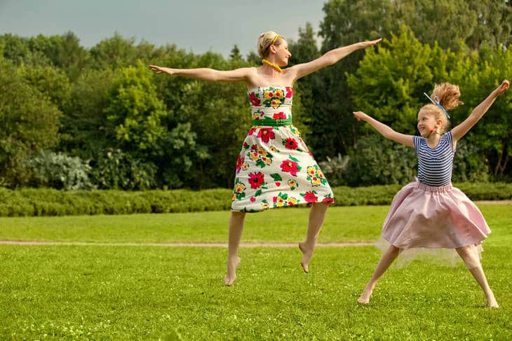 Mother and daughter dancing - Impact of karma on relationships