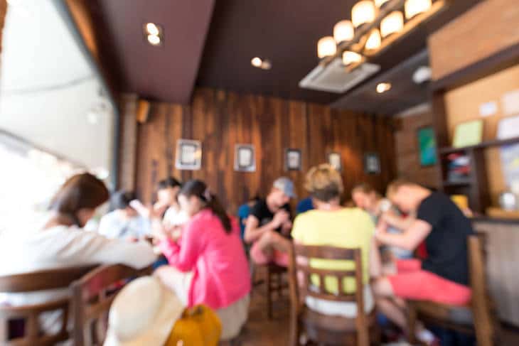 People talking in coffee shop