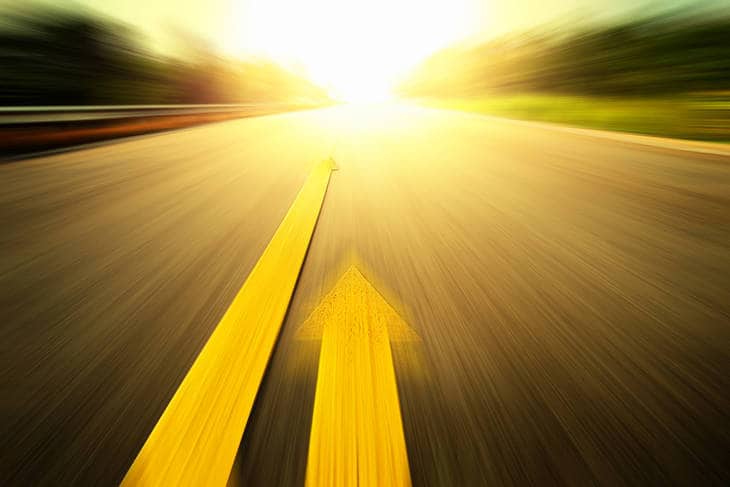 Yellow arrows on road - Navigating by synchronicity