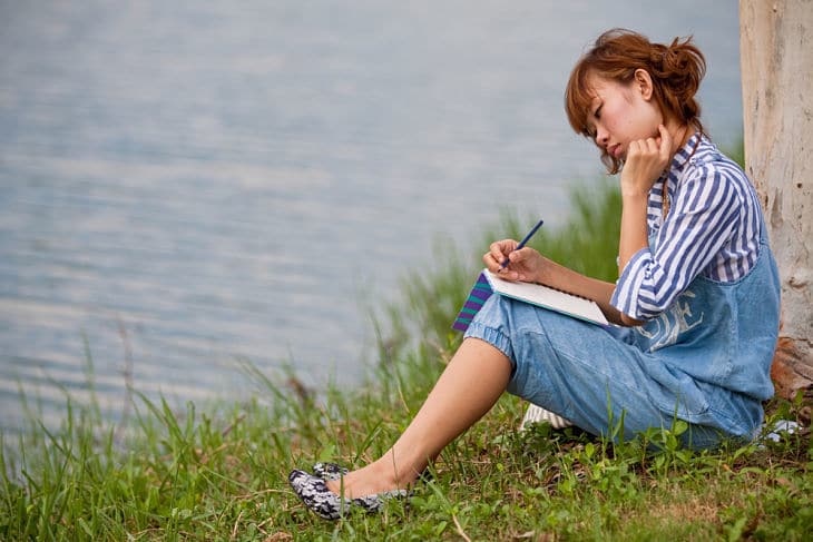 Woman in nature - writing
