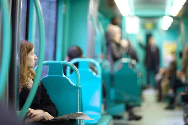 Lone woman on tram - Poems by Wendy E. Slater