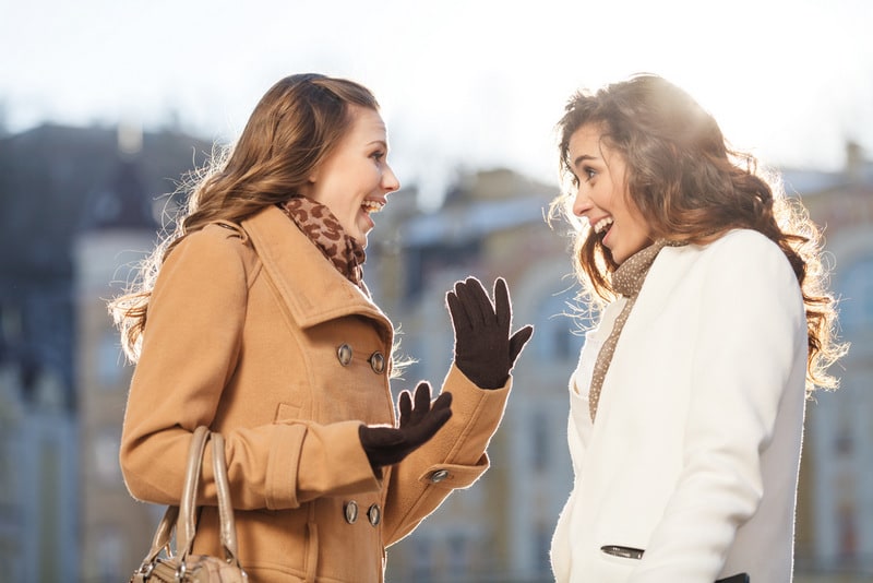 Two girls having an animated discussion