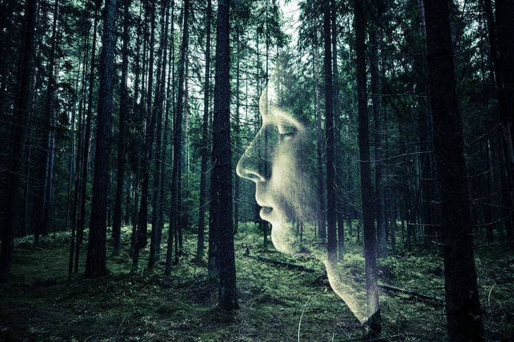 Man with closed eyes and forest as background - Mindful Awareness by Mike Larcombe