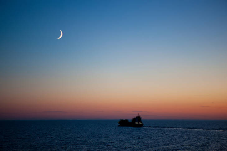 New crescent moon over sea - Poems by Julie Lauton