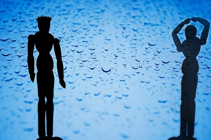silhouette male and female puppets