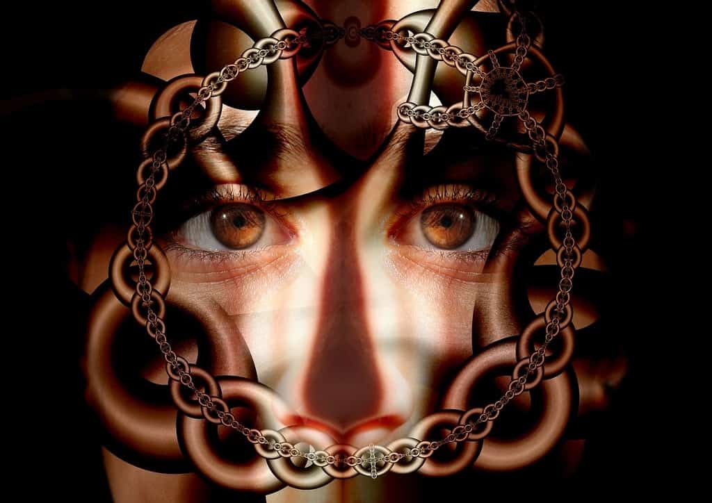 PSYCHOLOGICAL & SPIRITUAL THERAPY: Your experiences are separating you from other people and your community 13 Face looking through chains