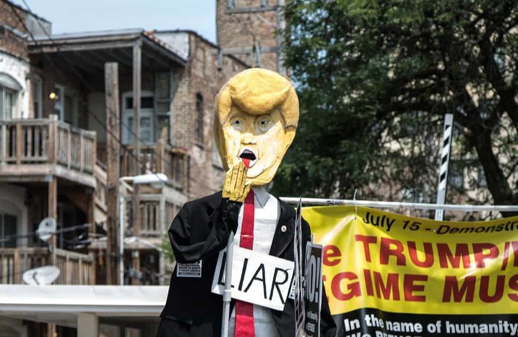 caricature of Trump with word 'liar'