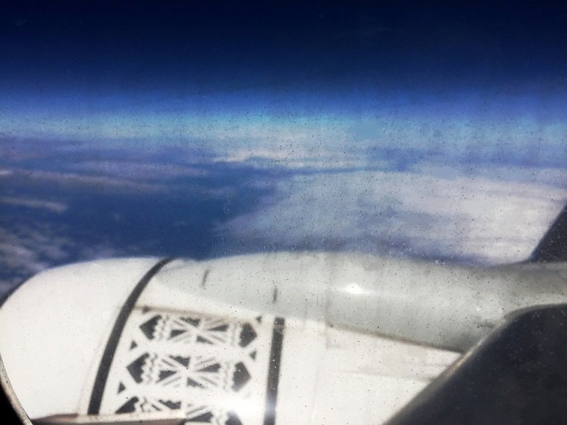 View of sky from airplane - Going down under and coming back up