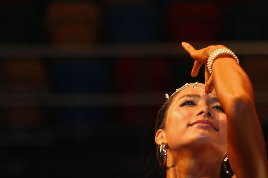 Woman pointing at third eye on forehead - Mind and consciousness