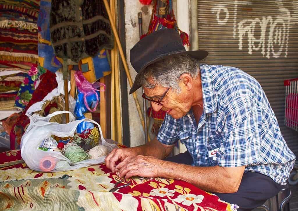 old man painting