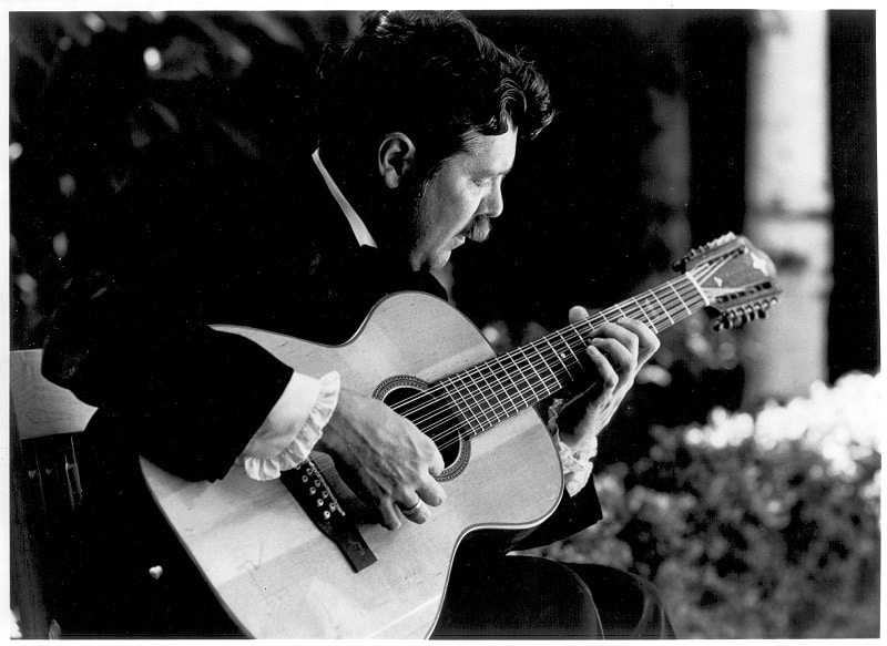 Robbie Basho playing guitar in tux - Voice of the eagle