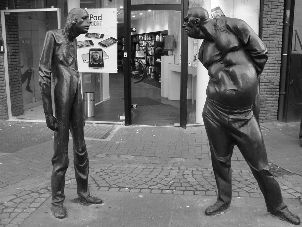 BINGE-PURGE: It takes small, slow steps to walk away from an eating disorder 13 statue of skinny man looking at fat man