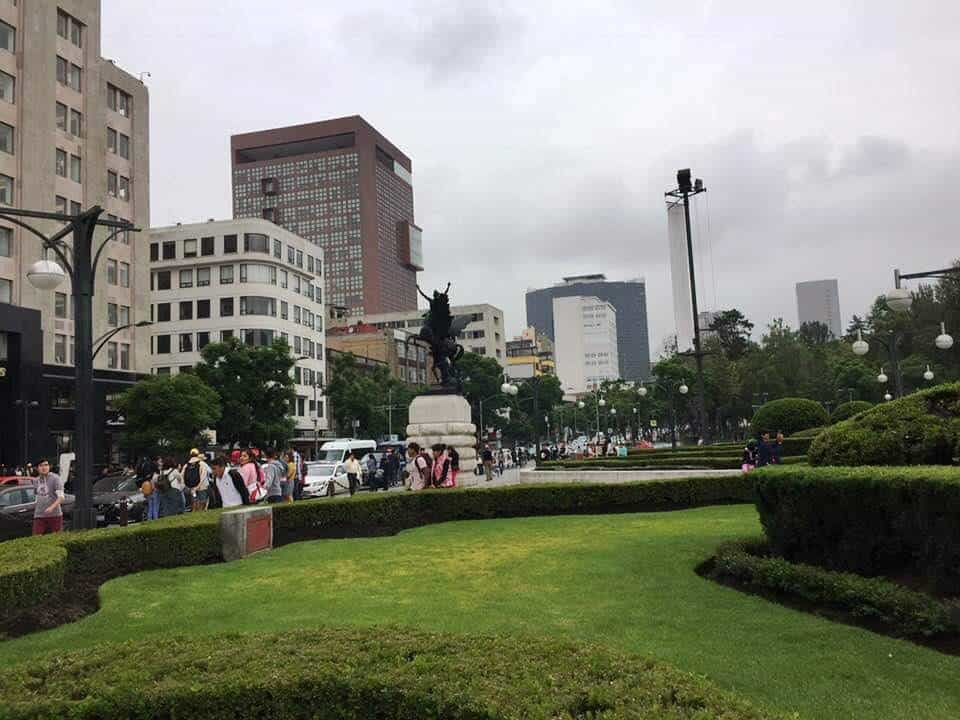 upbeat crowd strolling along Avenida Benito Juarez in Mexico City - A very full first day in Mexico City