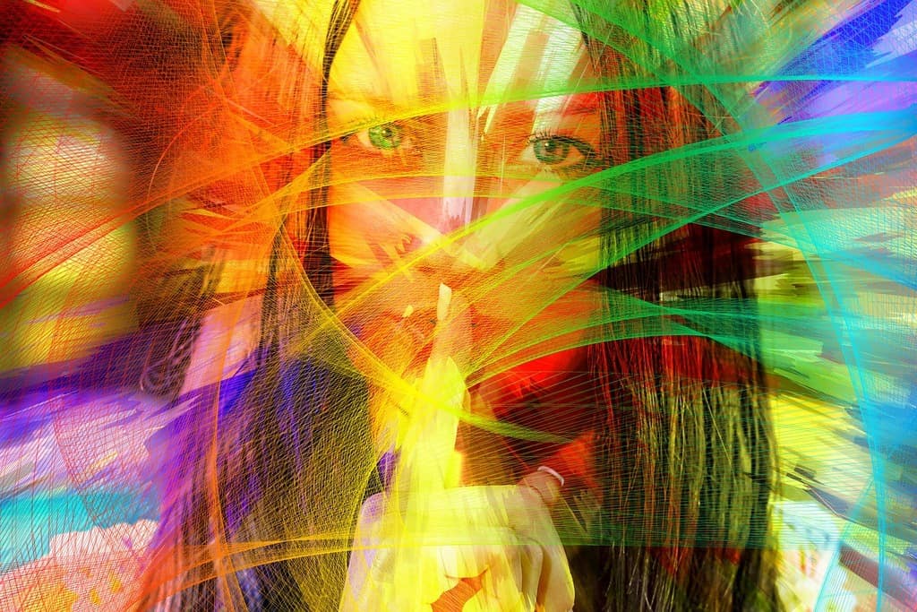 woman with finger to her mouth