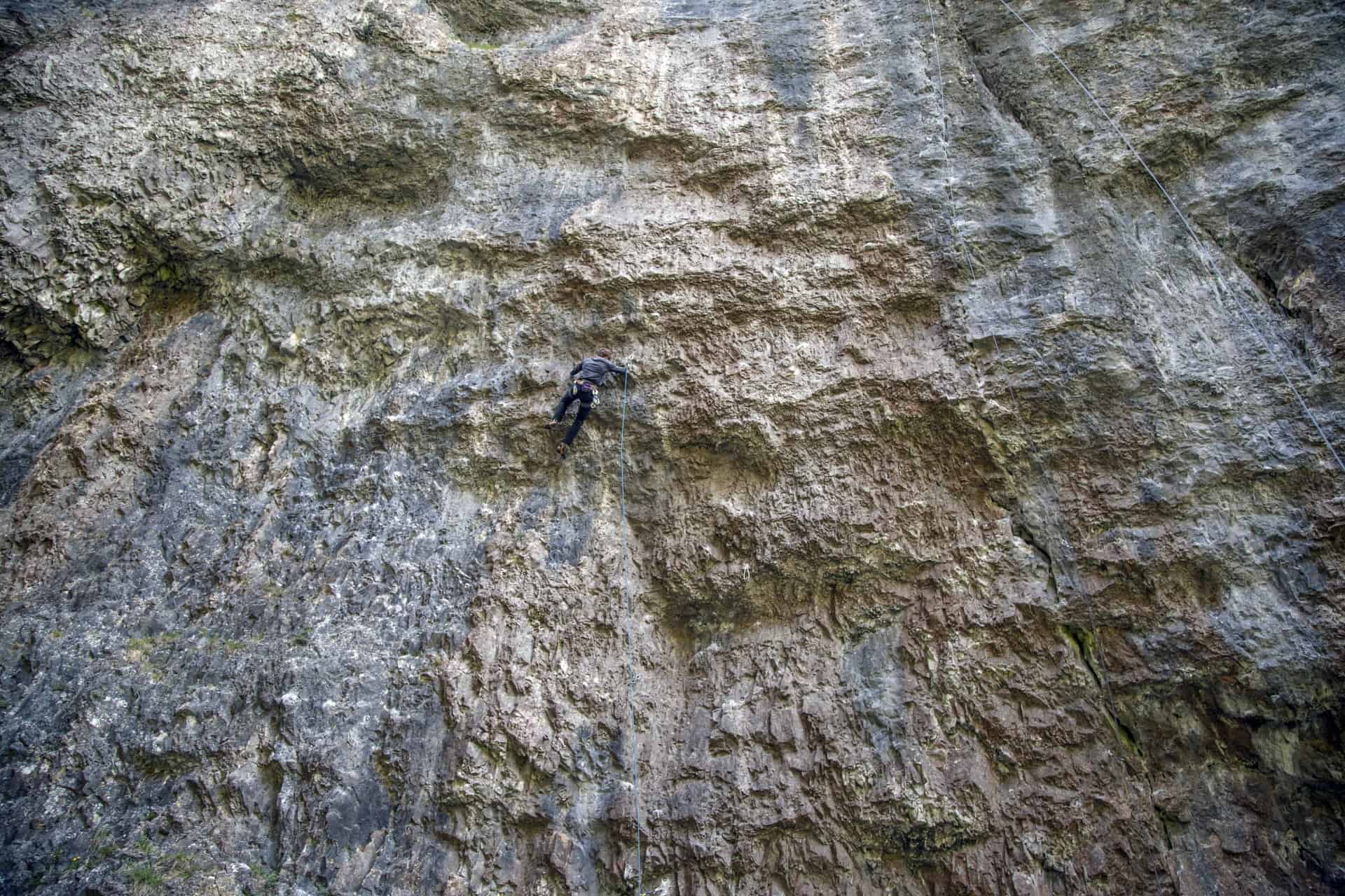 Person climbing bedrock - Acceptance is tricky
