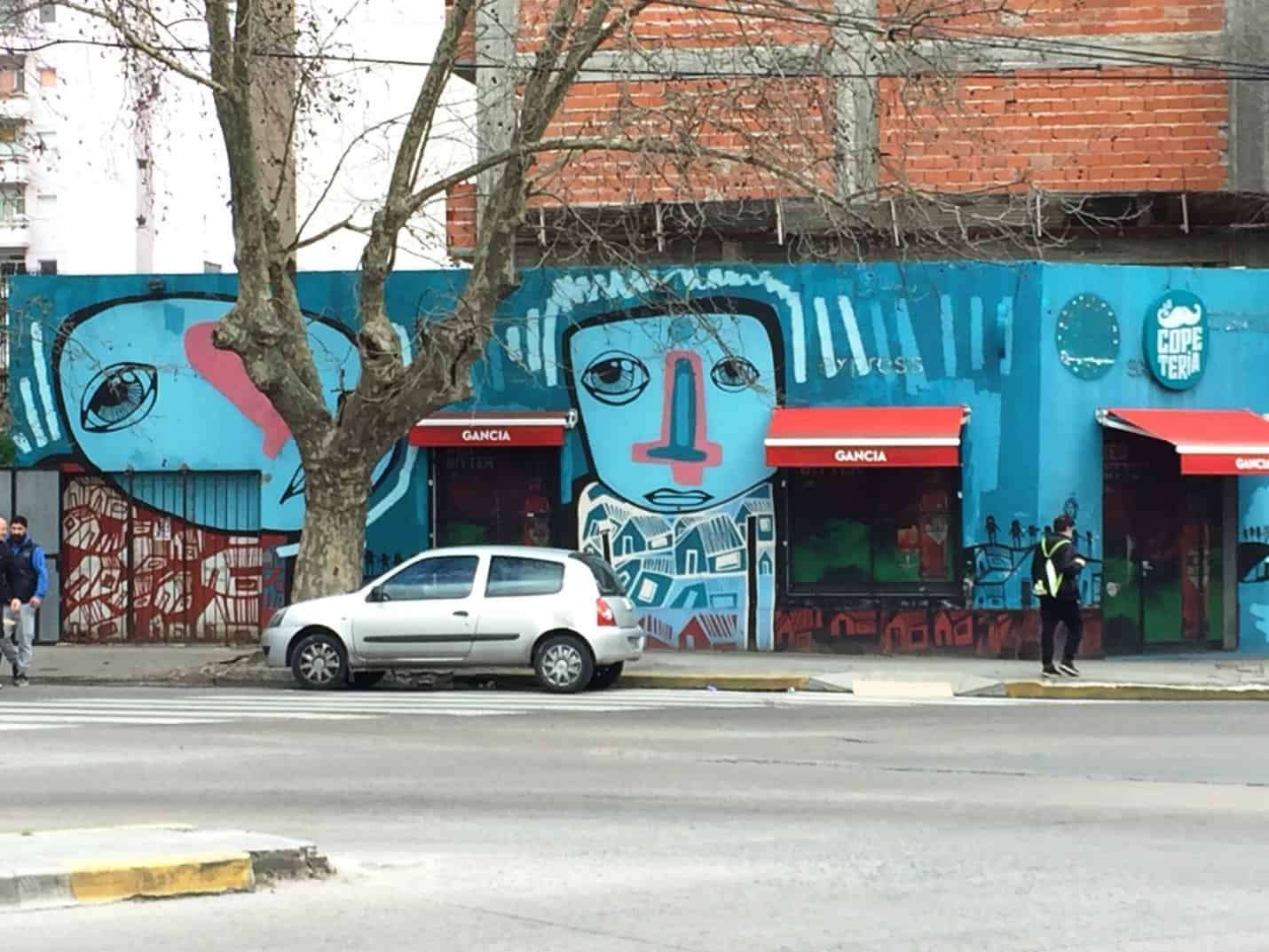 Street scene with car and attractive graffiti - La Plata