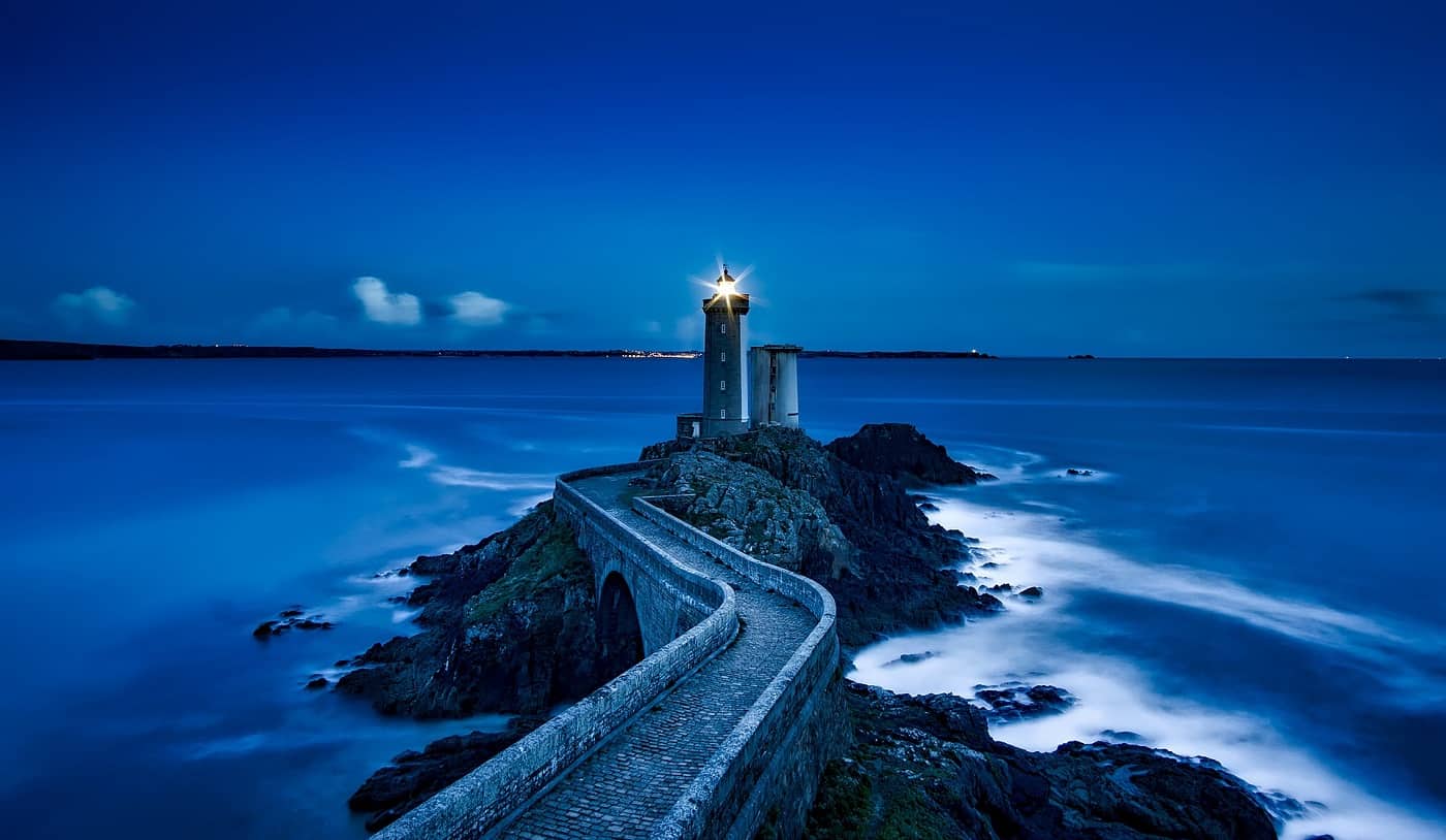 Path to lighthouse in ocean
