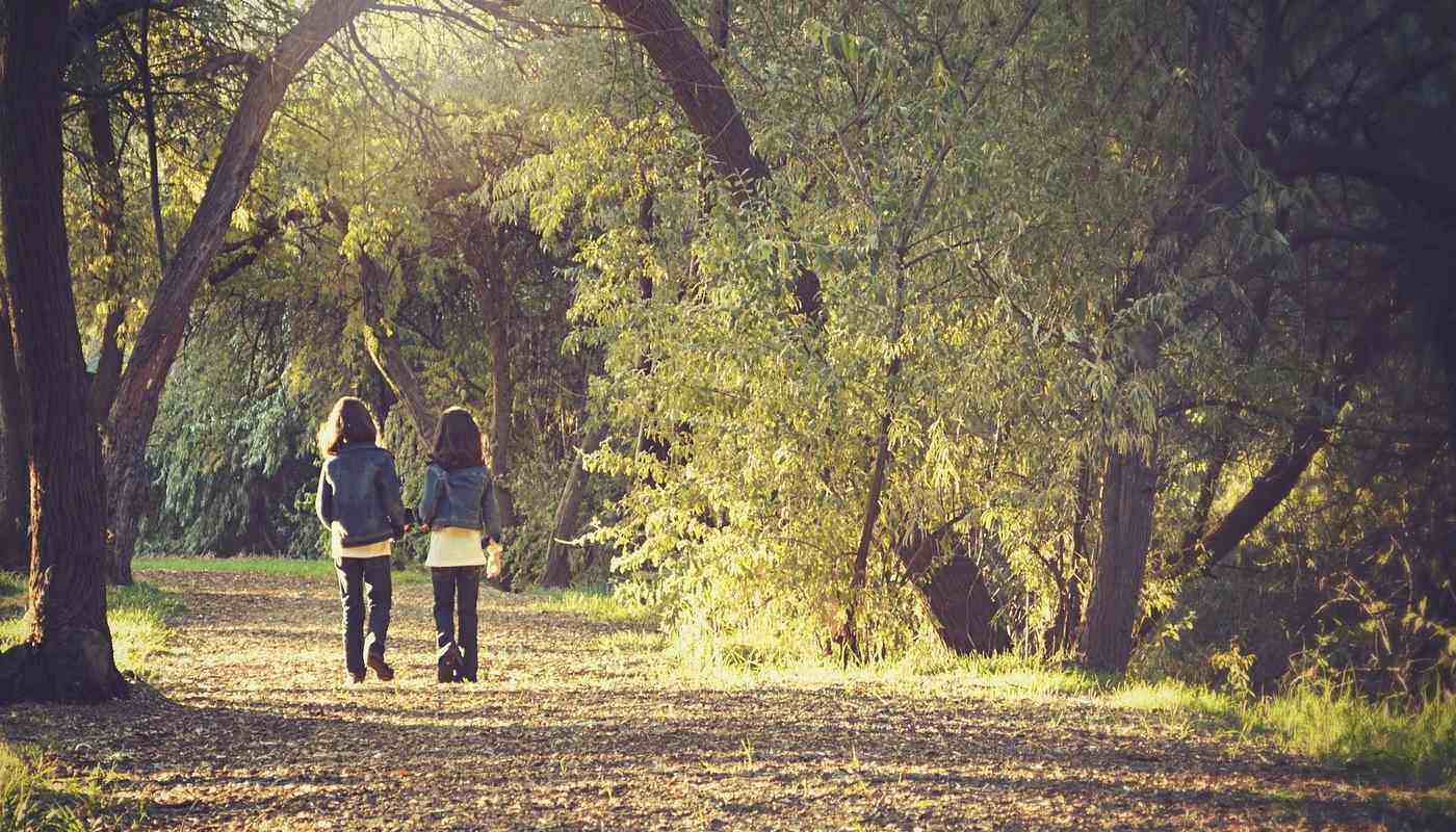 two young girls walking together