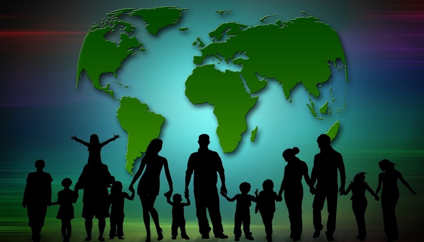 WE ARE ALL PART OF MOTHER EARTH: A spiritual vision of sustainability 13 people holding hands in front of globe