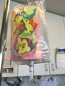 Chemo bag decorated with I am Joy