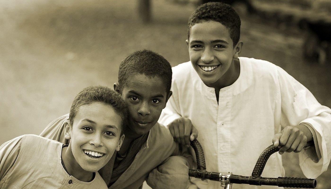 3 young boys smiling