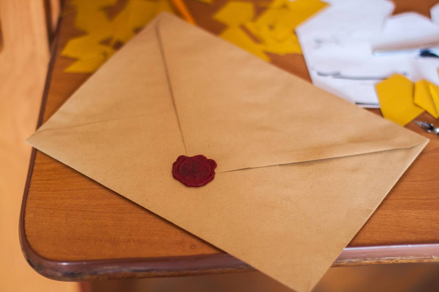 Brown envelope, probably for thank you card, on table