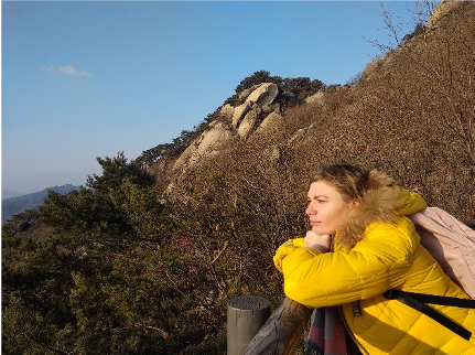 Diana sitting on a mountain