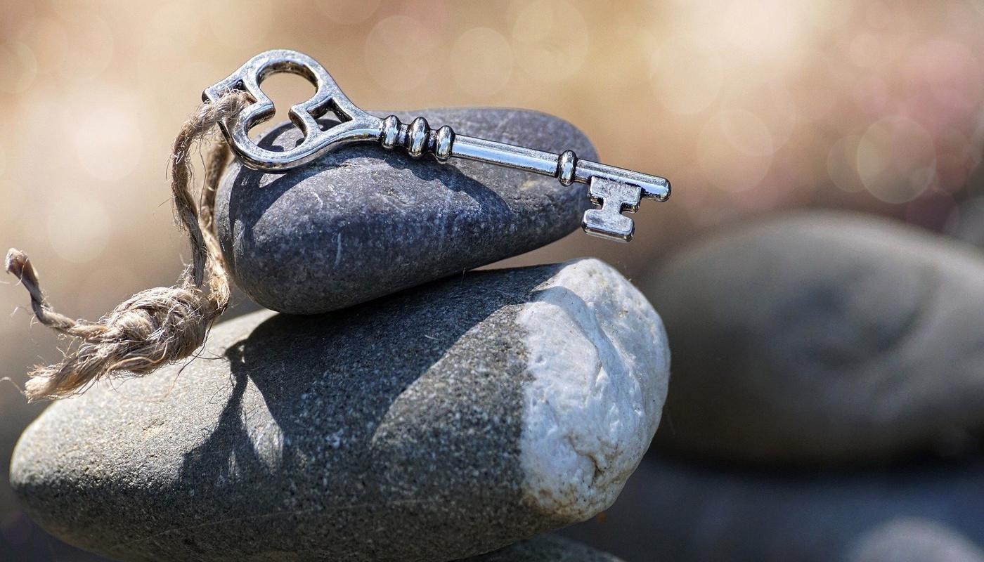 key on a heap of stones