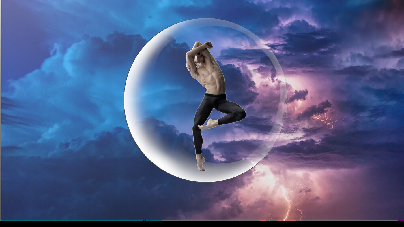 male ballet dancer in a bubble