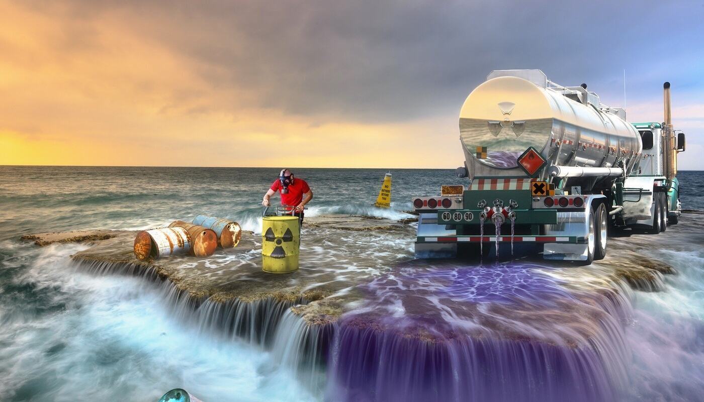 workers dumping toxic waste into waterfall