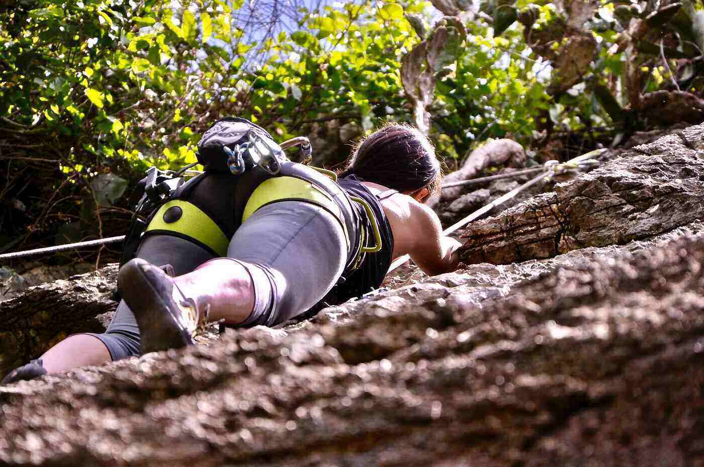 Woman rock climbing
