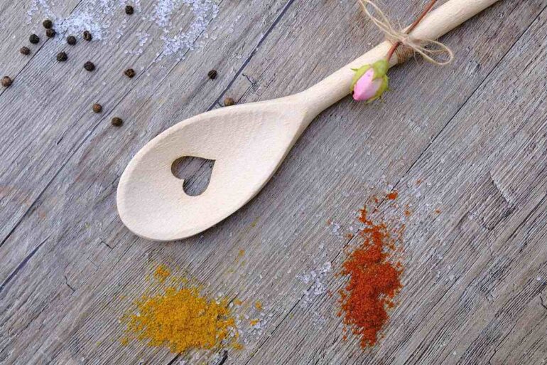 wooden spoon with a heart cut in the middle