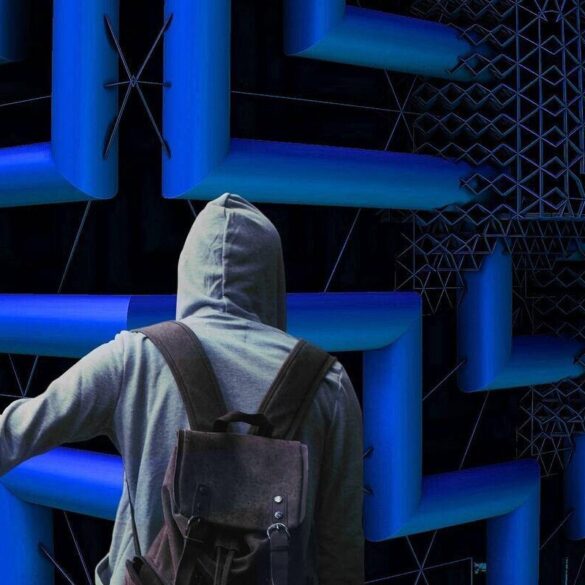 young man hitching a ride in front of a maze on a wall