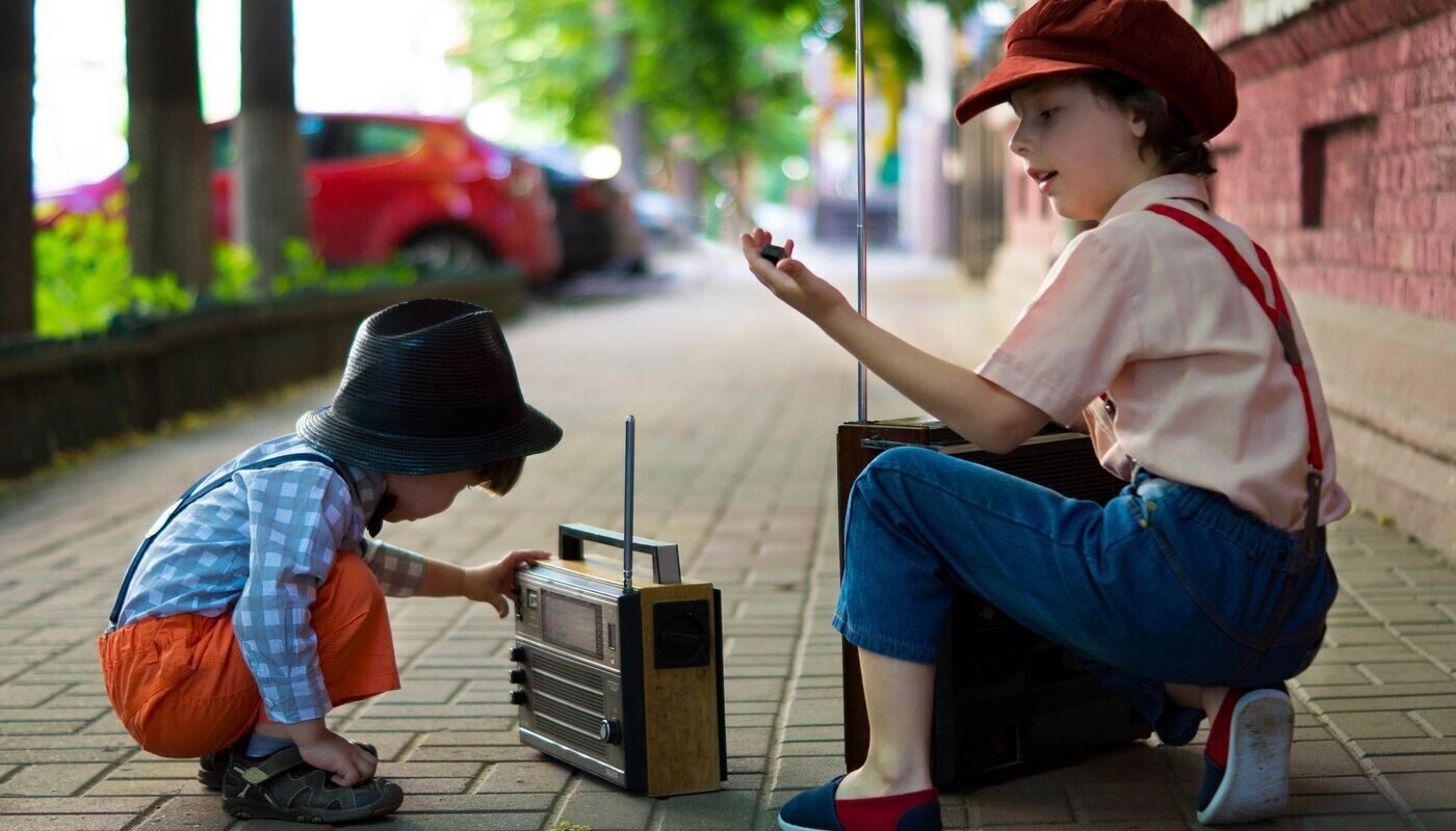 RAISE THE VOLUME ON YOUR SOUL’S VOICE: Live a life that is full, bright and abundant 13 two boys playing with a radio