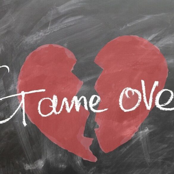 broken heart with game over written across it