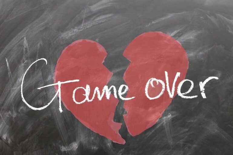 broken heart with game over written across it