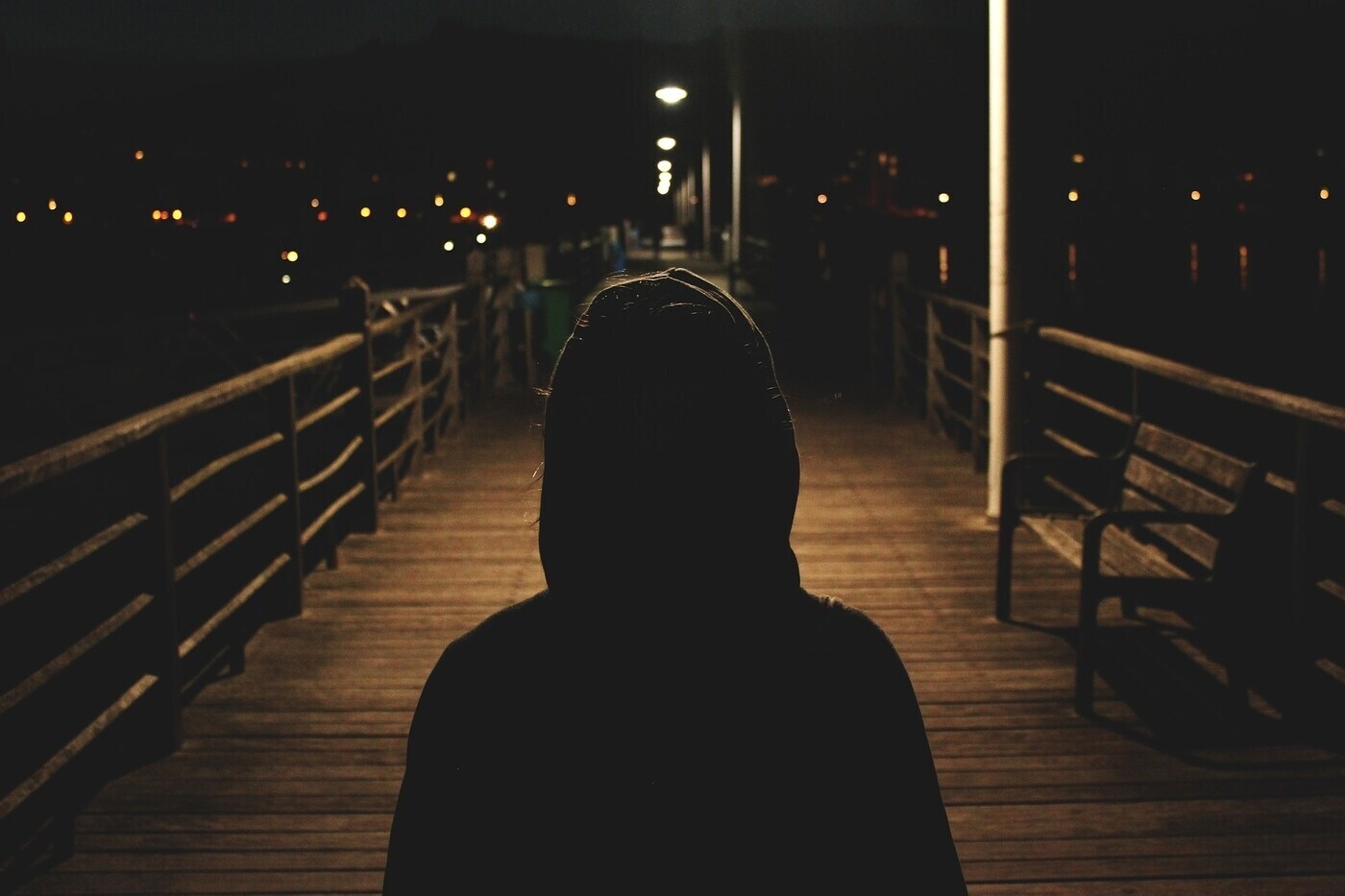 POEMS BY MIKE LARCOMBE: The No-Answer Answer, I Am the Love That I Seek, You Are Not Just You 13 Lone person walking across bridge in dark, wearing hoodie