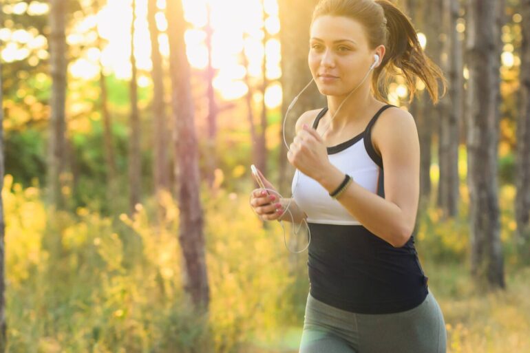 Woman running with headphones on